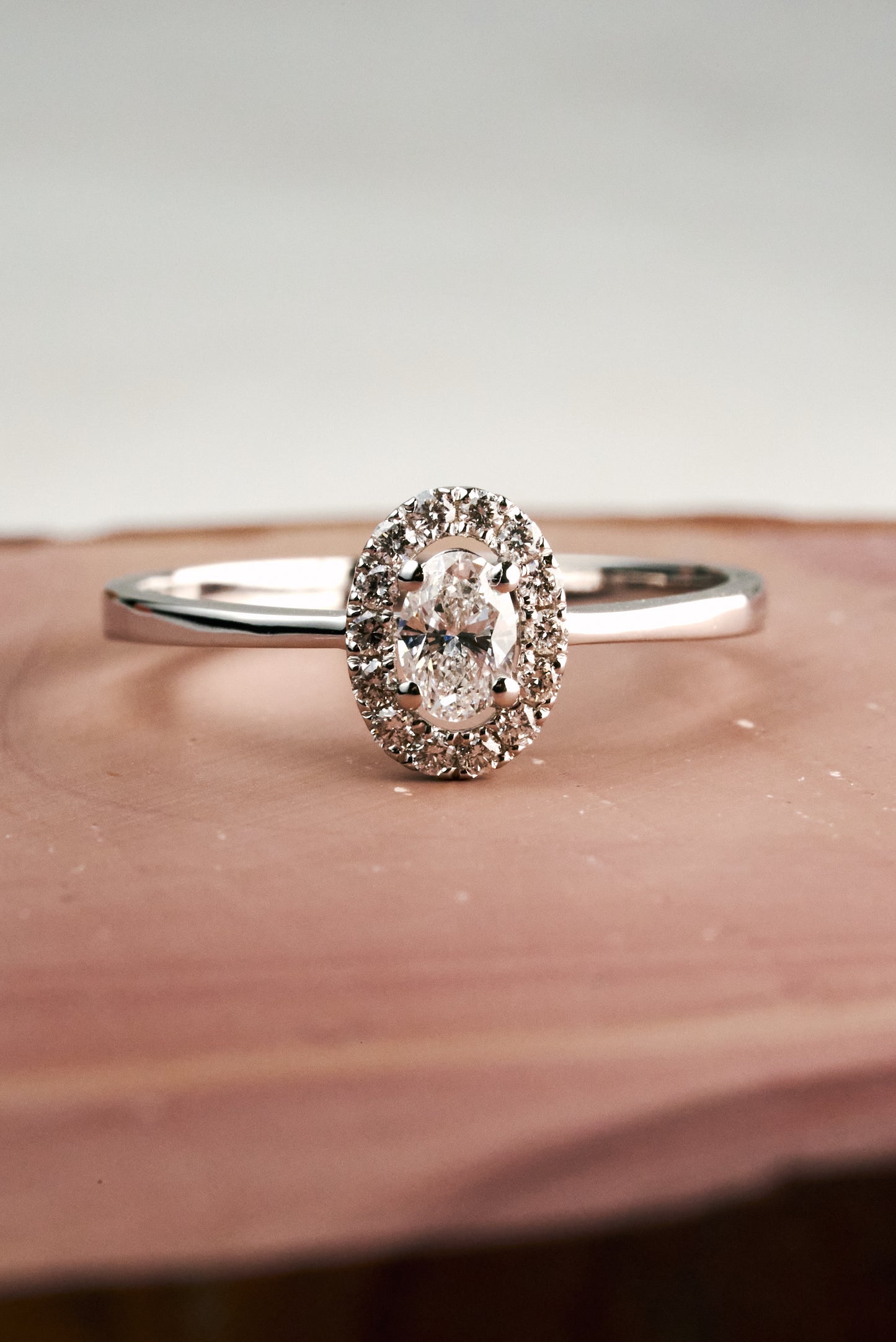 Verbena Halo Engagement Ring with Quarter-carat Oval Diamond