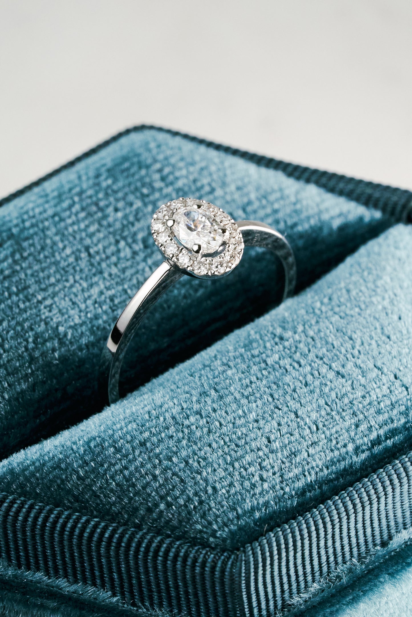 Verbena Halo Engagement Ring with Quarter-carat Oval Diamond