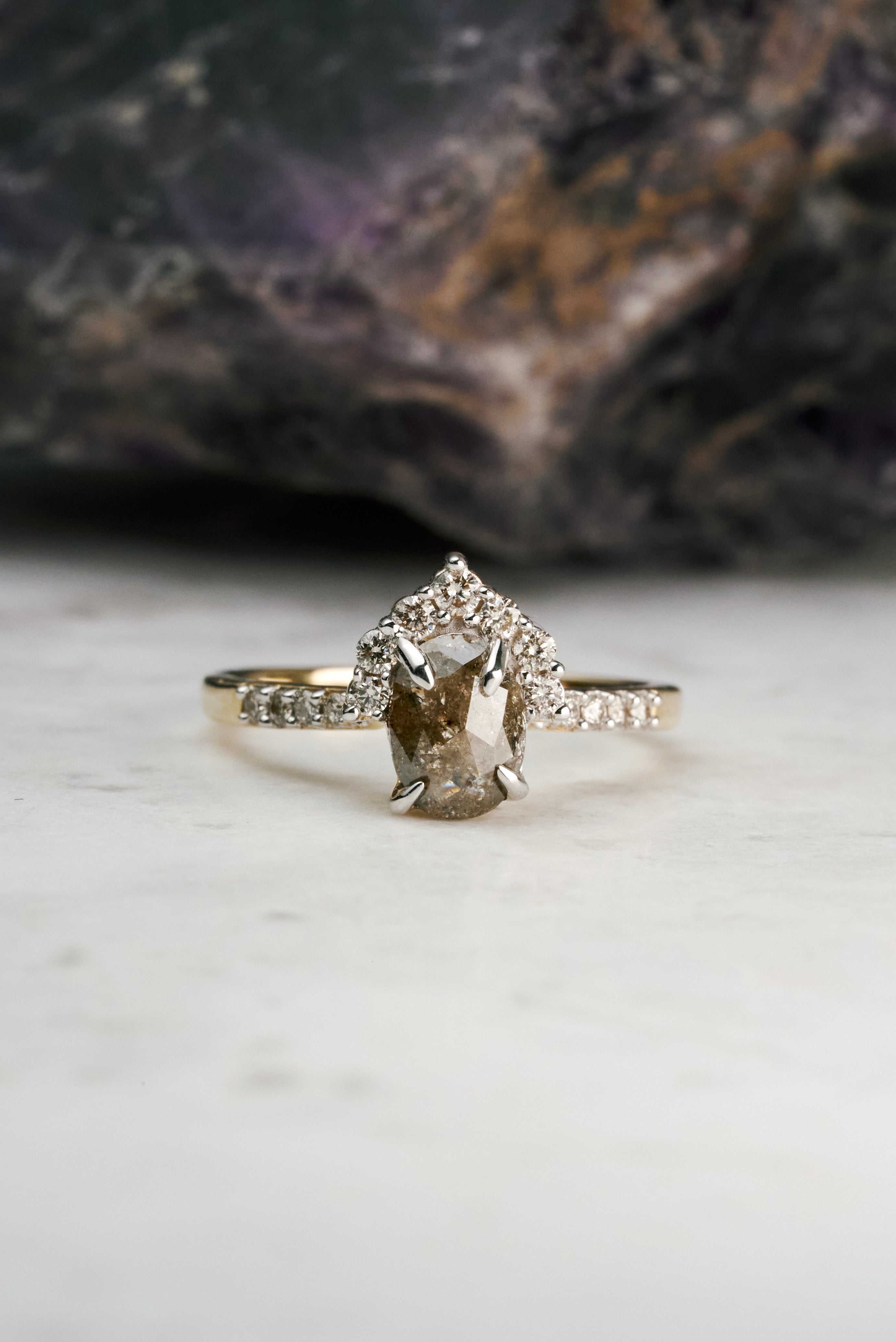 Salt and pepper halo engagement outlet ring